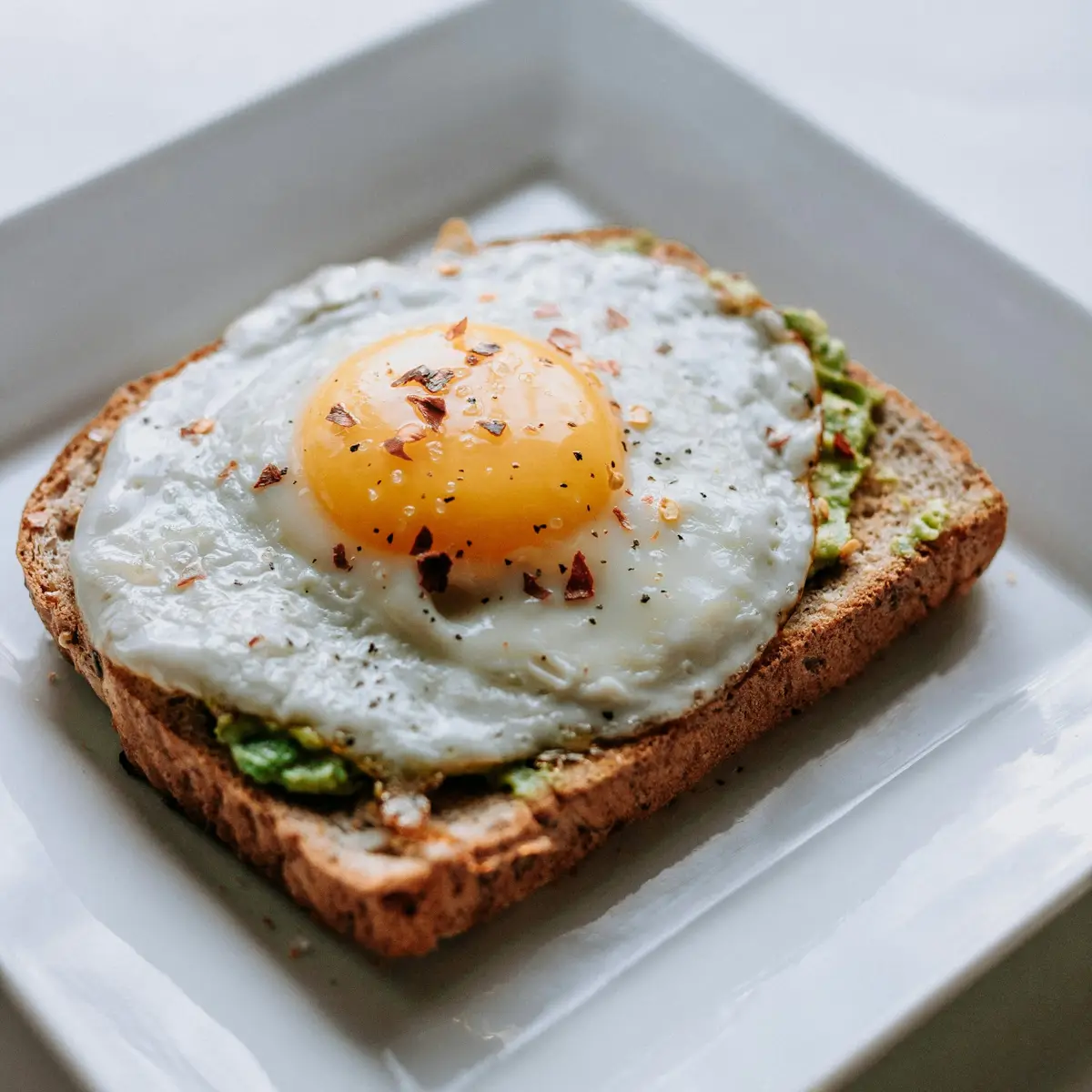 Eggs and toast on a breakfast plate