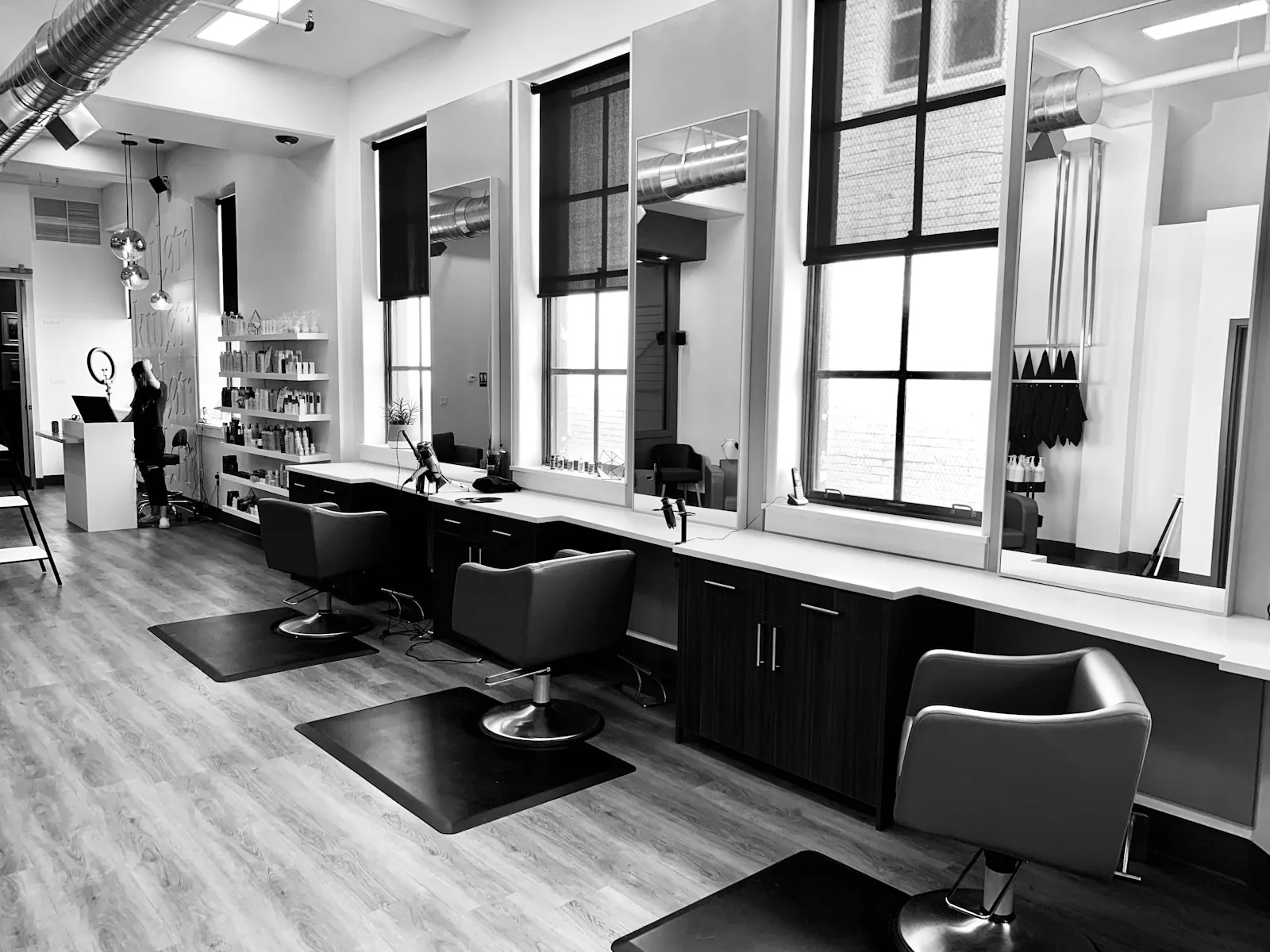 A hair salon chair and mirror
